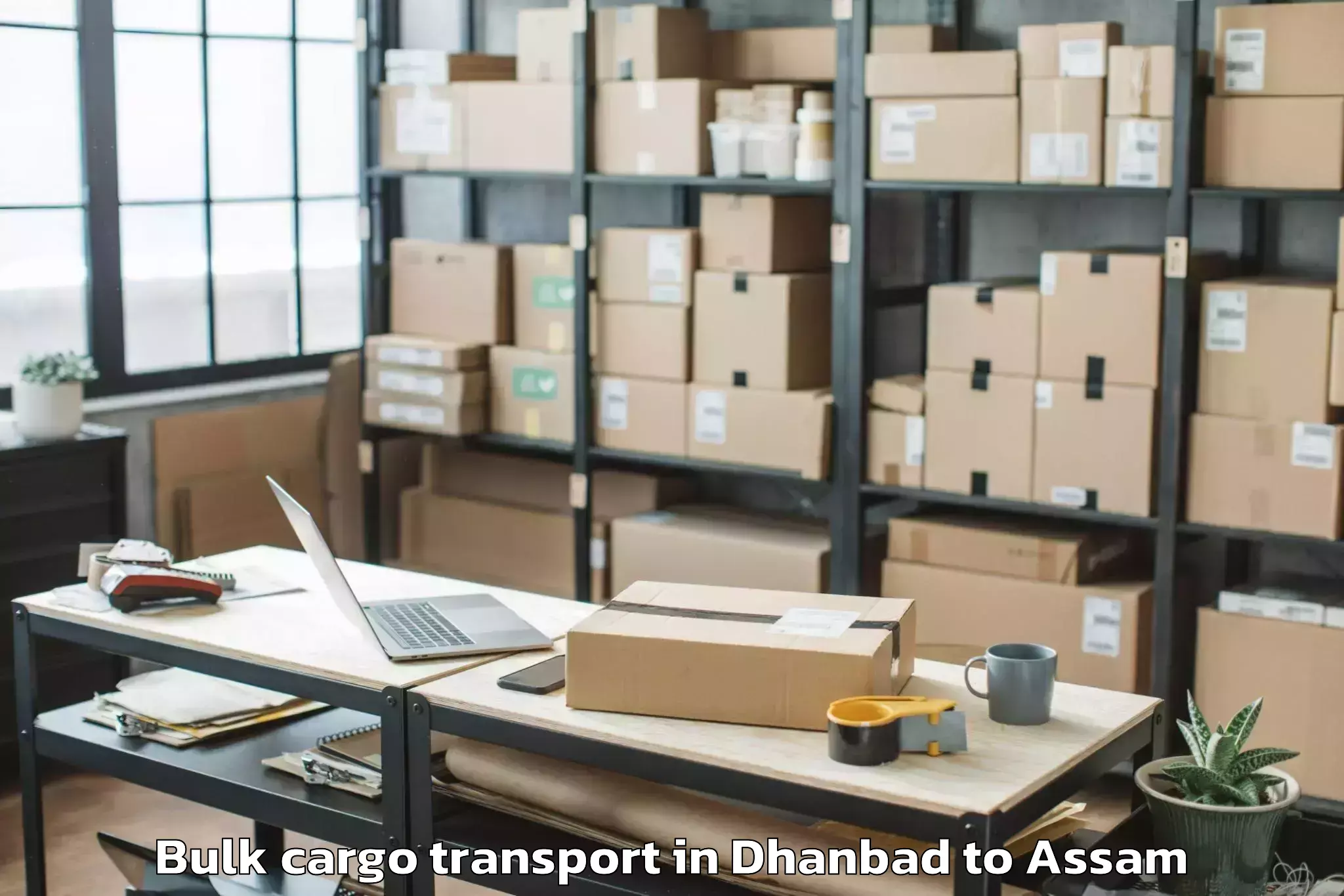 Dhanbad to Tengakhat Bulk Cargo Transport Booking